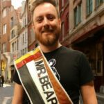 Picture of Kevin with the banner
